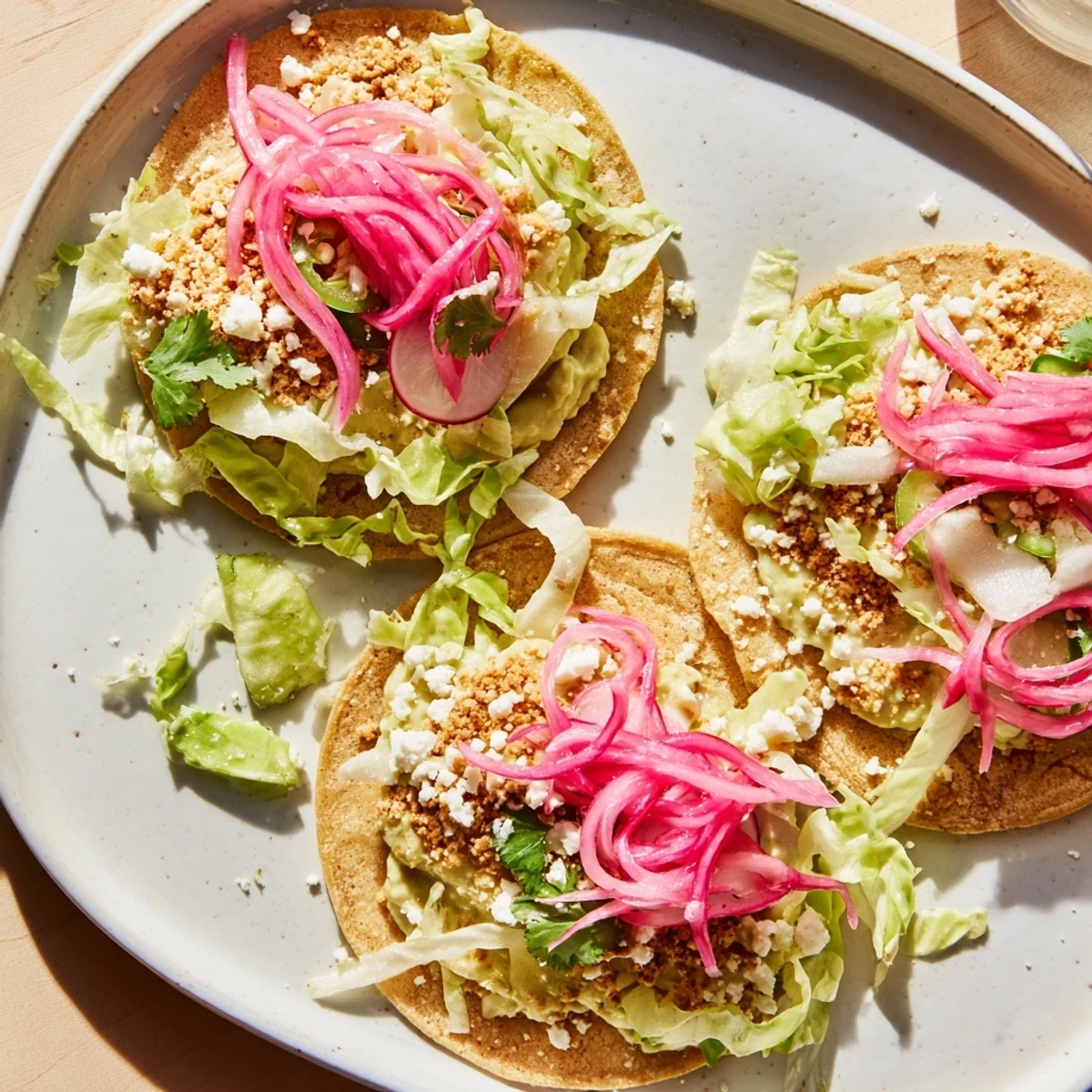 A vibrant photo of flavorful 5-Minute Pickled Red Onion Tacos featuring tangy red onions and fresh cilantro.