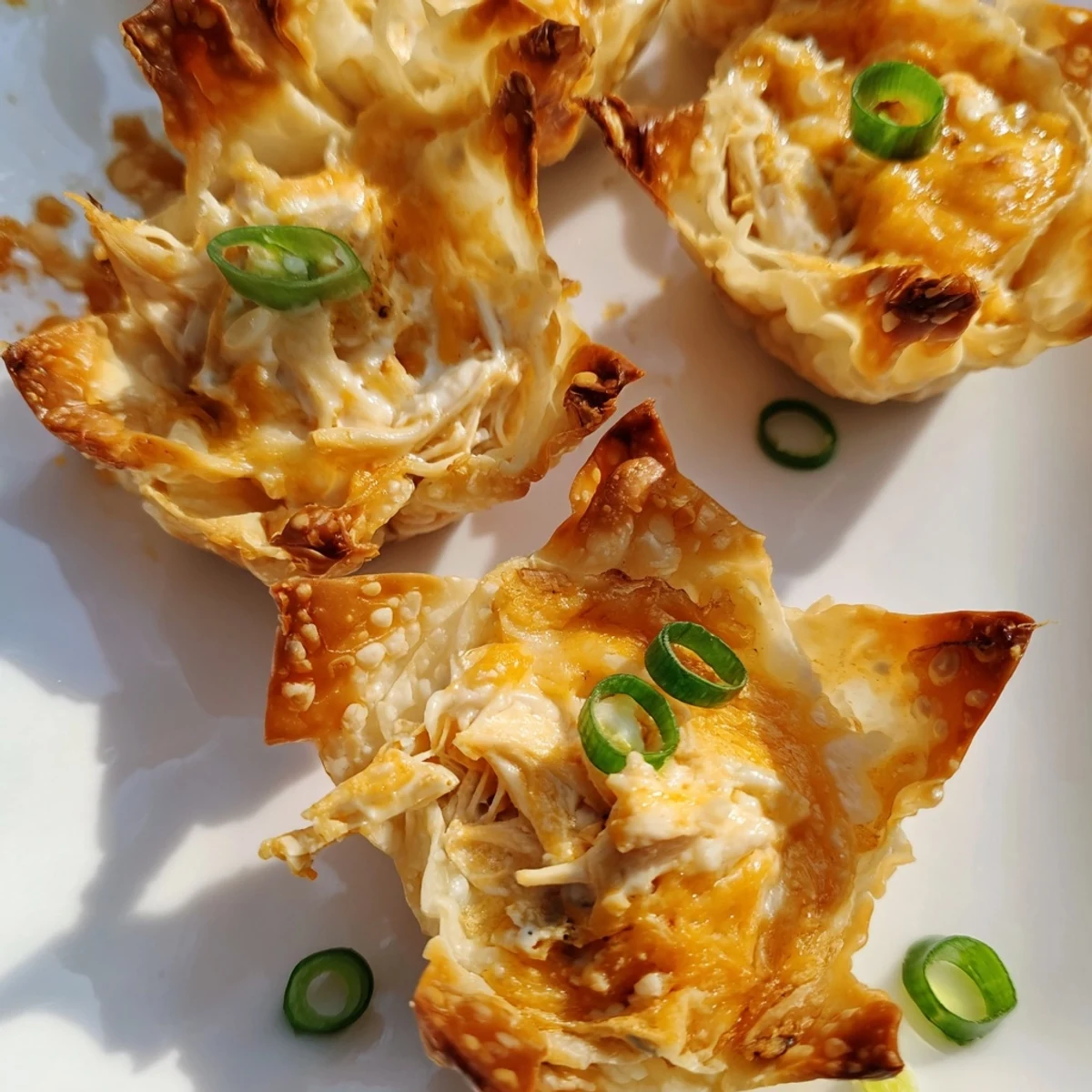 Golden-brown Buffalo Chicken Dip Pinwheel Wontons, a crowd-pleasing appetizer with crispy edges.