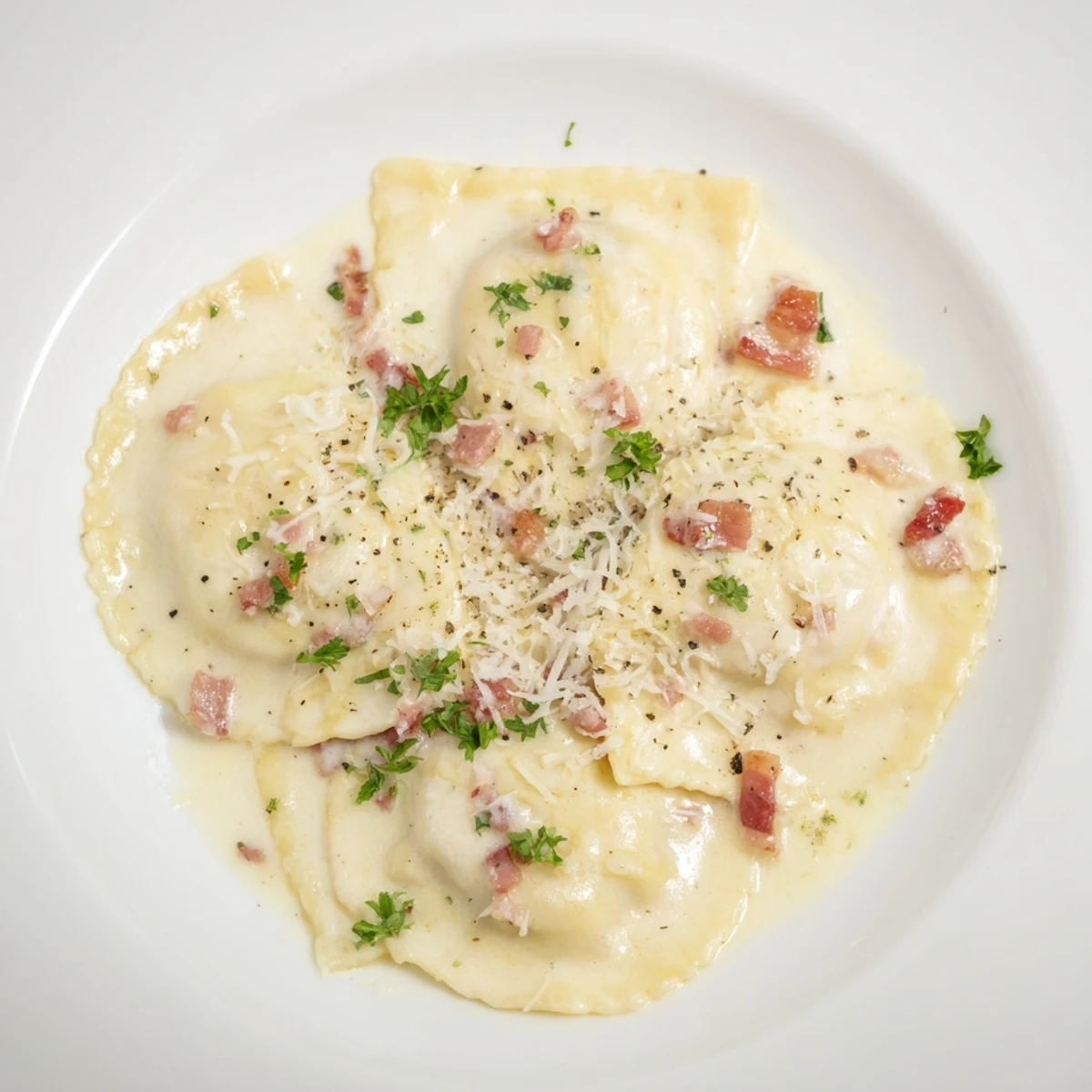 Golden-brown pancetta crisps atop a plate of rich Olive Garden Ravioli Carbonara, ready to be enjoyed.