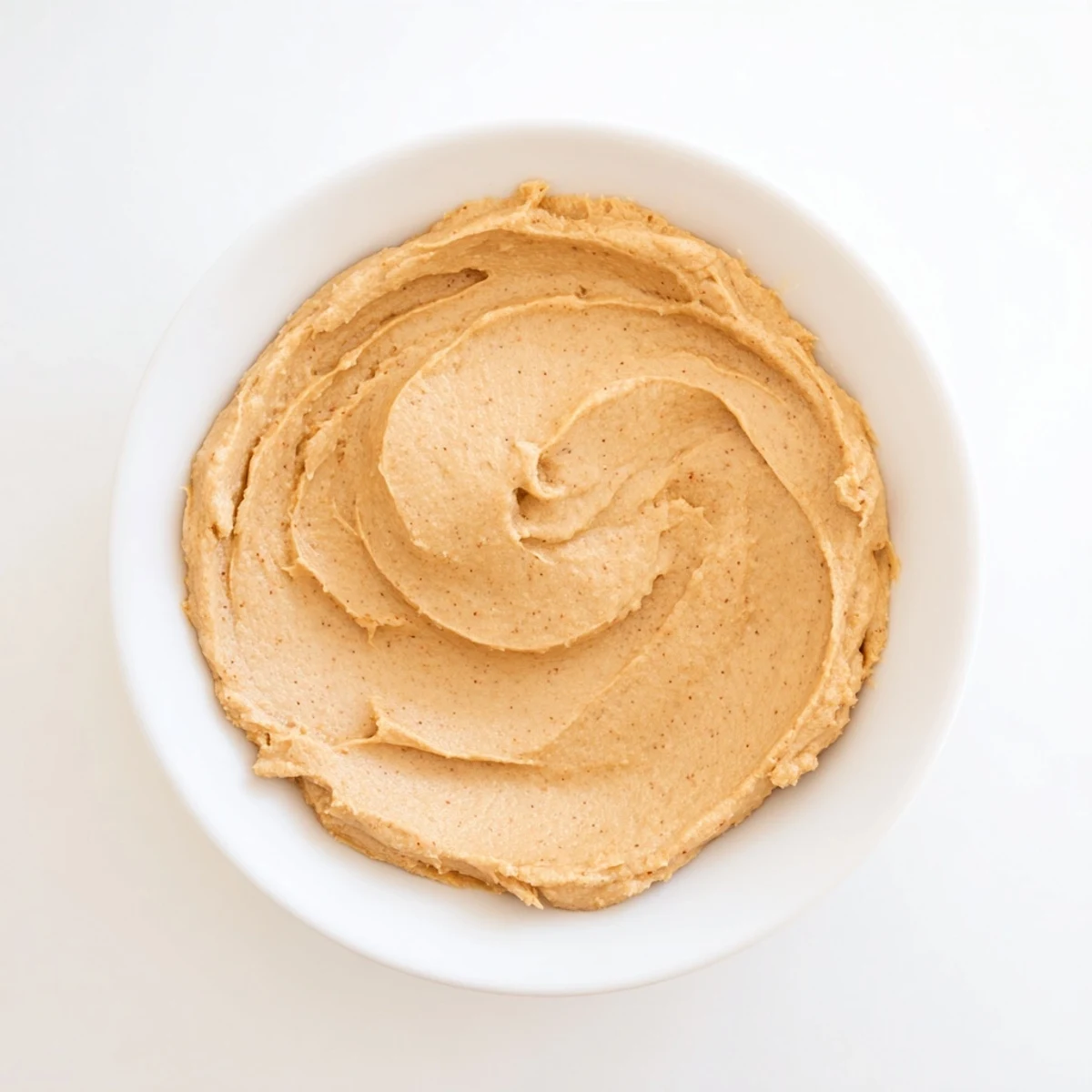 A close-up view of the smooth, spiced Quick Christmas Cookie Butter Spread, perfect for winter mornings.