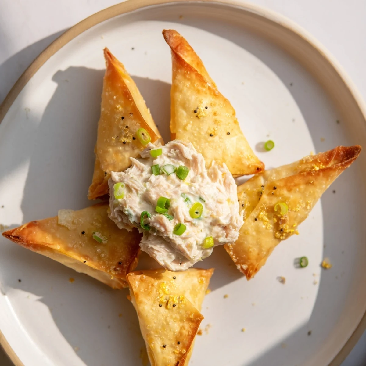 Freshly made, crispy Air Fryer Lumpia Chips, perfectly paired with a flavorful chicken cream cheese dip.
