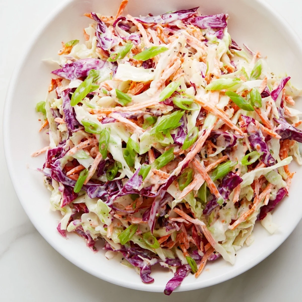 Bright and flavorful Quick Coleslaw Salad, a classic creamy side dish perfect for summer barbecues.