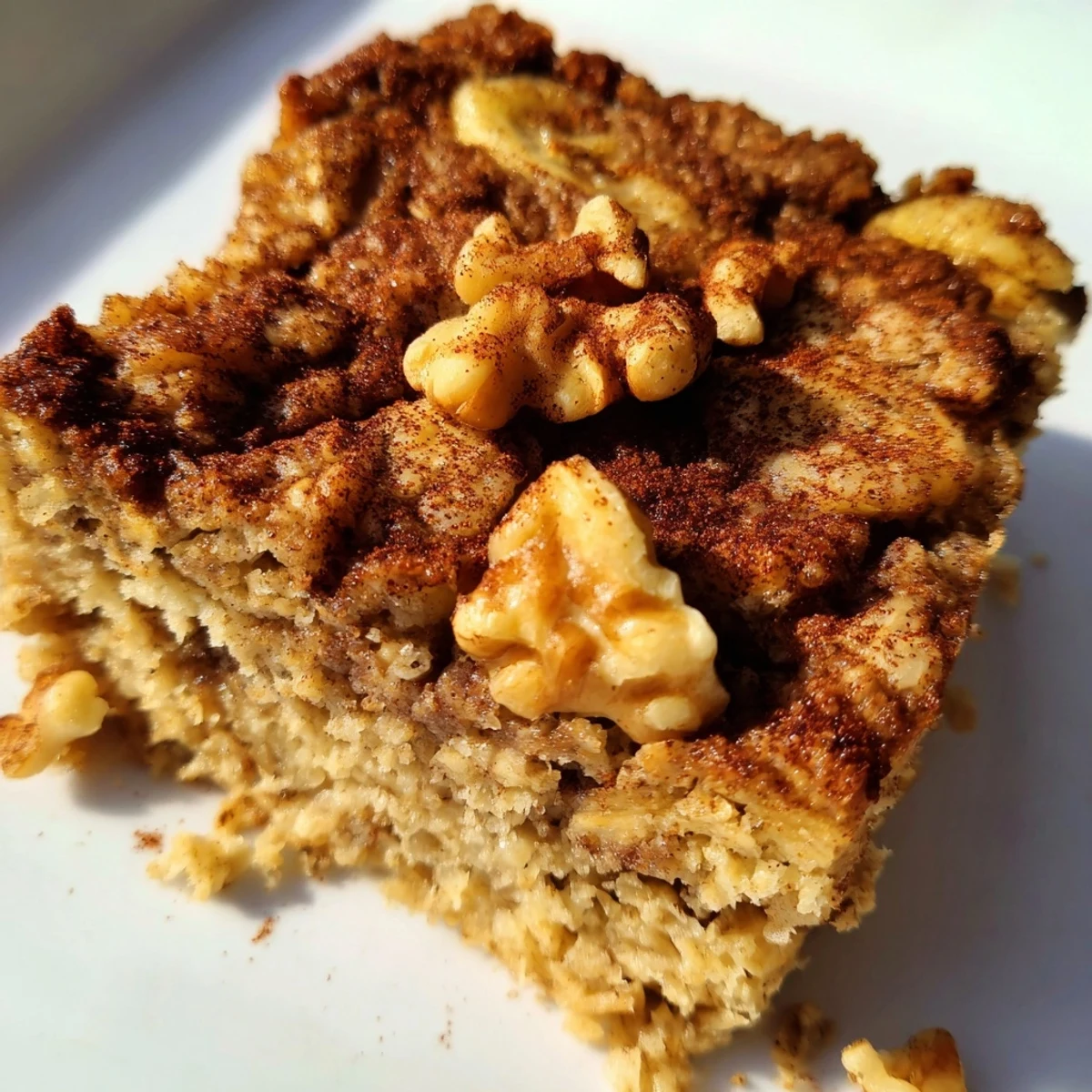 Fluffy and moist Baked Oats That Taste Like Cake, showcasing a rich, cake-like texture with chocolate chips.