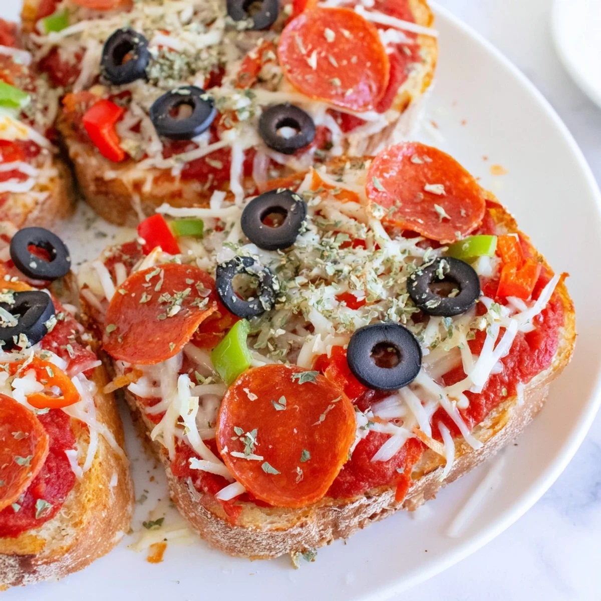 Crispy, garlic-buttered bread transforms into delicious Air Fryer Pizza Toast, loaded with marinara and melted mozzarella.