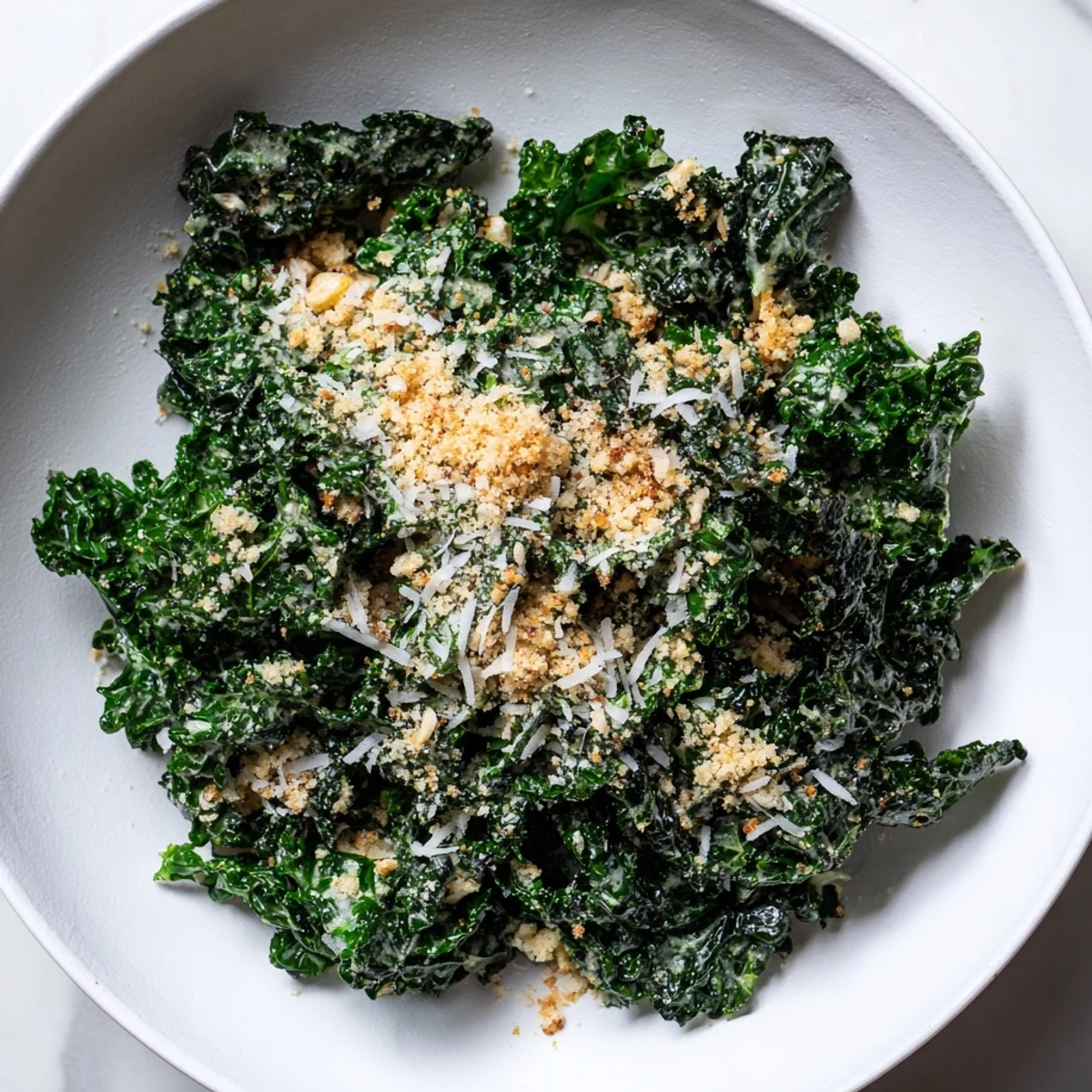 Freshly tossed Garlic Parmesan Kale Salad: a delicious vegetarian lunch, ready to enjoy.