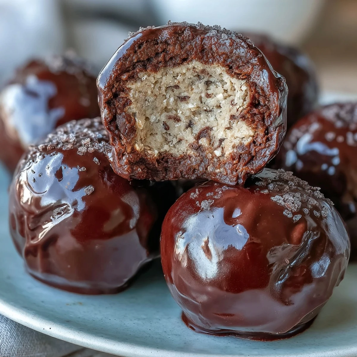 1. Vegan chocolate peanut butter protein balls with oats and cocoa, rolled into bite-sized energy snacks.  