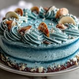 Enchanting Cancer Zodiac Cake, showcasing a moist vanilla crumb with dreamy blue buttercream.