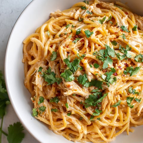 A bowl of creamy chipotle chicken spaghetti.