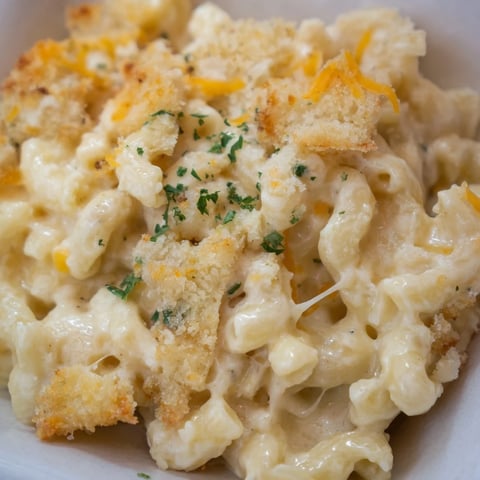 Creamy truffle macaroni and cheese topped with golden panko breadcrumbs fresh from the oven.  
