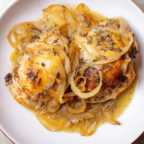 Golden-brown Instant Pot French Onion Chicken, topped with melted Gruyère, looks rich and incredibly savory.