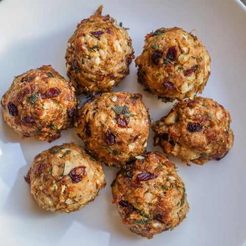 Golden brown Quick Christmas Stuffing Balls, crispy outside, savory inside, ready for a warm holiday meal.