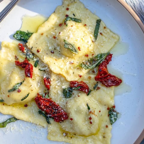 Homemade Sun-Dried Tomato Spinach Ravioli, a burst of savory flavors in delicate pasta.