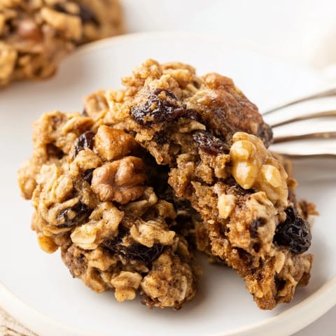 Homemade Cinnamon Date Nut Oatmeal Cookies, chewy with a nutty crunch, ready to enjoy.