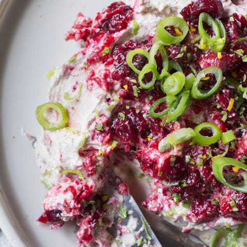 Close-up of bright-red Spicy Ginger Cranberry Jalape&amp;ntilde;o Dip: sweet, spicy, and tangy.