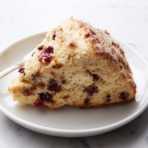 Light and airy Sparkling Cherry Soda scones topped with coarse sugar and tart cherries.  