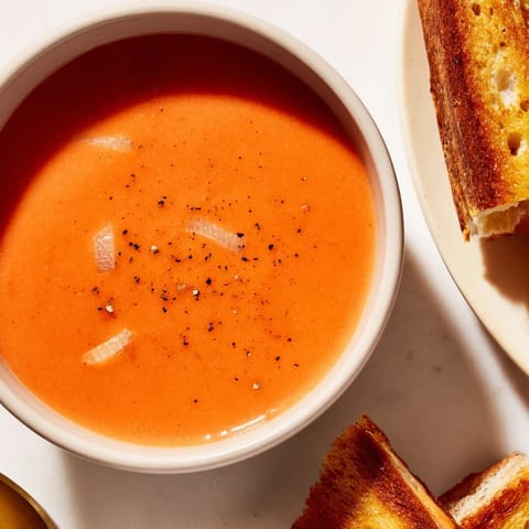 Enjoy this classic American 5-Ingredient Tomato Soup & Grilled Cheese Dunk Combo with perfect, melty cheese!
