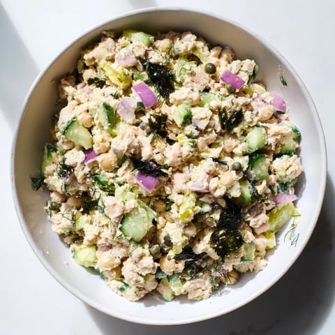 Savory chickpea tuna salad recipe, perfect for sandwiches, showcasing a plant-based alternative.