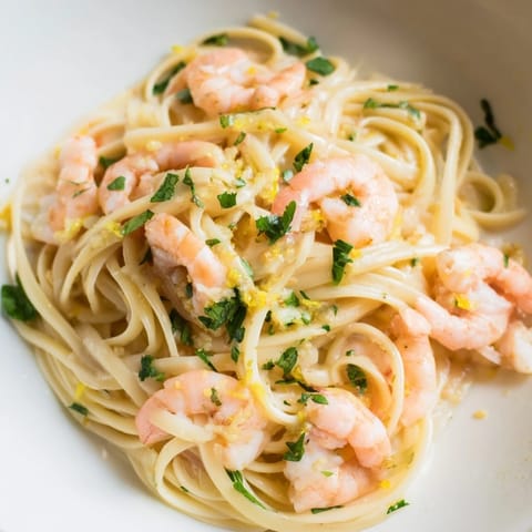 Sizzling skillet of Shrimp Scampi With Linguine featuring tender seafood tossed in lemony garlic butter for a quick weeknight dinner.