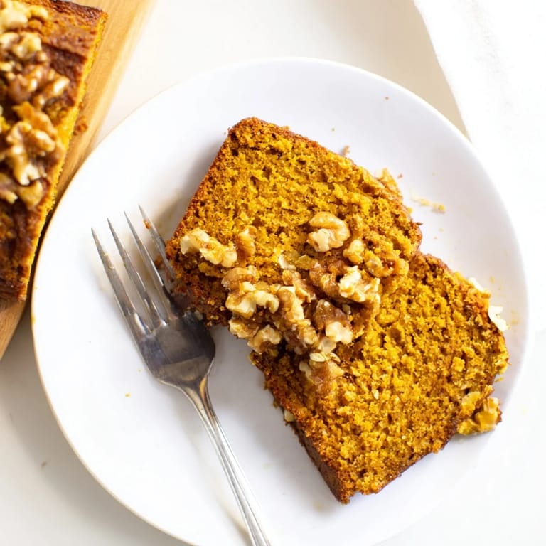 Enjoy a quick mug of pumpkin bread, a budget-friendly snack with its comforting, homemade taste.