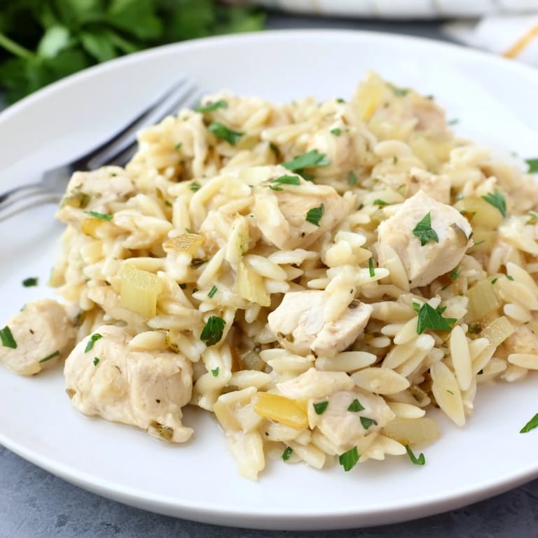 Savory One-Pot Cajun Chicken Alfredo Orzo with a rich sauce and tender chicken, ready in minutes.