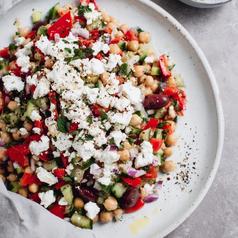 Freshly assembled Mediterranean Chickpea and Feta Bowl, a hearty vegan meal bursting with flavor and textures.